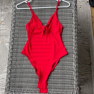 Red body suit